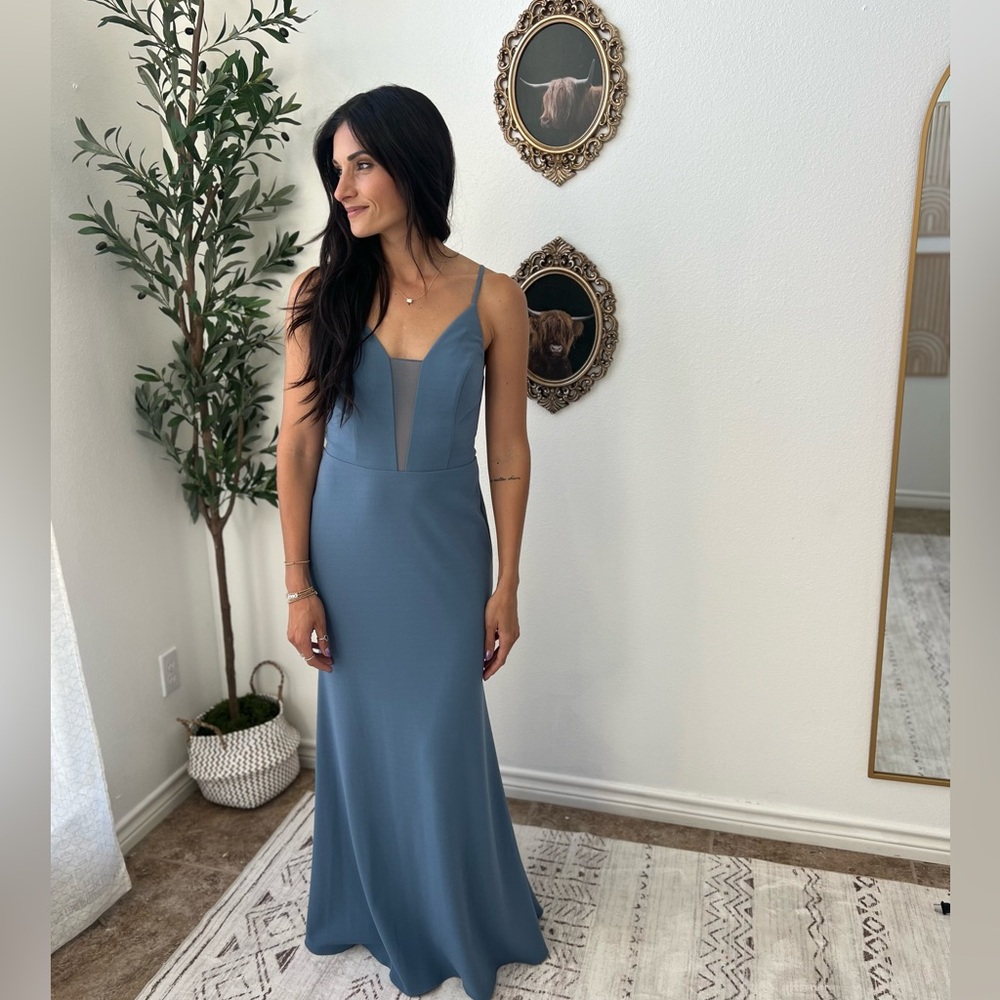 Elegant Blue Bridesmaid Dress with lace details in the front.
